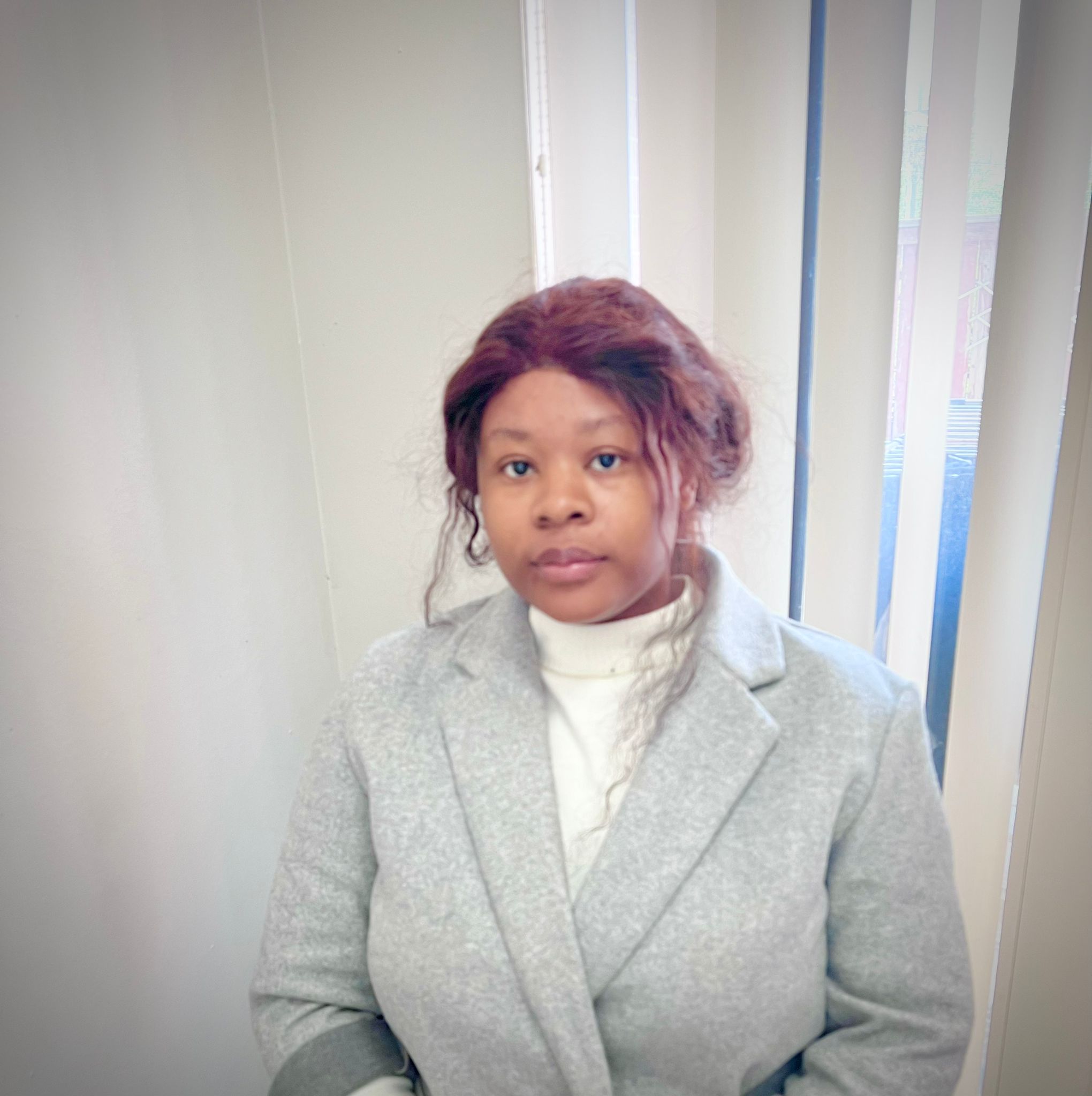 Portrait of Mercy Osazee Aikhionbare